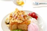 Honey Toast And Whipping Cream With Ice Cream On White Stock Photo