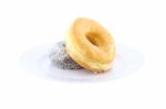 Sugar And Chocolate Donut Side View On Dish On White Background Stock Photo