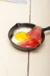 Egg Sunny Side Up With Italian Speck Ham Stock Photo