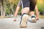 Young Athletes At Starting Position Ready To Start A Race. Sprin Stock Photo