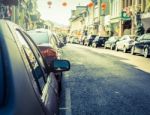 Many Cars Parking On The Road In Old Town Of Phuket Stock Photo