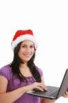 Santa Lady With Laptop Stock Photo