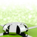 Green Gift Box With Bokeh Backdrop Stock Photo