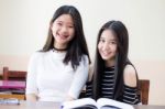 Two Asia Thai High School Student Uniform Best Friends Beautiful Girl Reading Book Stock Photo