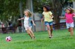 Group Of Childrens Having Fun In The Park Stock Photo