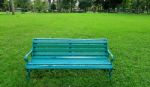 Metal Garden Chair On Green Grass Stock Photo