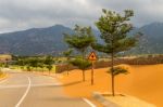 Sand On An Empty Road Stock Photo