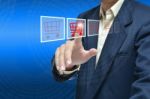 Man Touching Shopping Cart Stock Photo