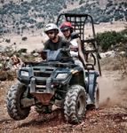 Man Riding Quad Bike Stock Photo