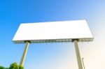 Blank Billboard At Blue Sky Background, Mock Up With Flare Stock Photo