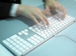 Speedy Typing On Keyboard Stock Photo