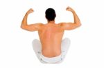 Sat Man Showing Muscles Back Stock Photo