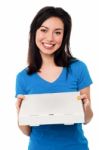 Young Lady Holding Pizza Box Stock Photo