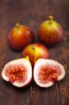 Fresh Figs Over Old Wood Stock Photo