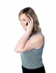 Woman Talking Over Phone Stock Photo