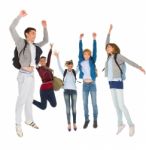 Teenage Students Jumping Stock Photo