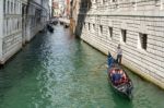 Gondoliers Ferrying People In Venice Stock Photo