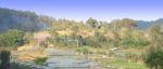 Terraced Plastic Cover Farm Near Mountain Stock Photo