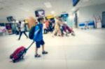 Blurred Crowd Of Tourist In The Airport Stock Photo