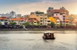 Boat And Cityscape In Singapore Stock Photo