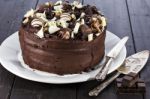 Chocolate Cake With Shovel And Cutting Knife Stock Photo