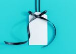 Tag With Ribbon On Blue Stock Photo