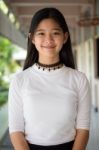 Portrait Of Thai Student Teen Beautiful Girl Relax And Smile Stock Photo