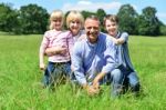 Happy Family Having Fun At Outdoors Stock Photo