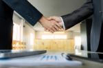 Two Confident Business Man Shaking Hands During A Meeting In The Stock Photo