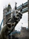 David Wayne Sculpture Girl With The Dolphin Next To Tower Bridge Stock Photo