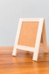 Empty Chalkboard On Wooden Board And Gray Background Stock Photo