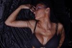 Woman Trapped In Black Fishnet Stock Photo