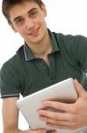 Teenage Boy Using Ipad Stock Photo