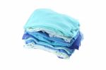 Pile Of Blue Shade Cloths On White Background Stock Photo