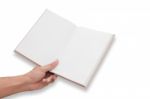 Hand With Opening Blank Notebook Stock Photo