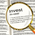 Invest Definition Magnifier Stock Photo