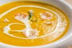 Pumpkin And Shrimps Cream Soup Stock Photo