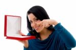 Young Woman Pointing Jewelry Box Stock Photo