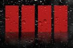 Artwork Red Label On Rain Drop Background Stock Photo