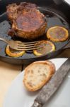 Pork Chop Seared On Iron Skillet Stock Photo