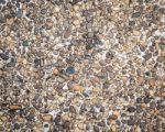 Many Little Stone Are In Concrete Floor Background Stock Photo