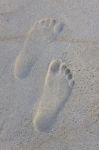 Foot Print On Sand Beach Stock Photo