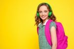 Smiling Girl Posing With Headphones Stock Photo