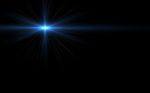 Blue Digit Lens Flare With Bright Light In Black Background Used Stock Photo