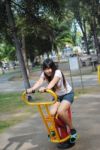 Girl Playing In Park Stock Photo