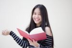 Portrait Of Thai Teen Beautiful Girl Reading Book Stock Photo