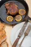 Pork Chop Seared On Iron Skillet Stock Photo