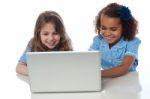 Cute Little School Girls With Laptop Stock Photo