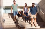 Portrait Of Group Friends Having Fun In The Street Stock Photo