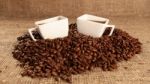 Cups With Coffee And Coffee Beans Stock Photo